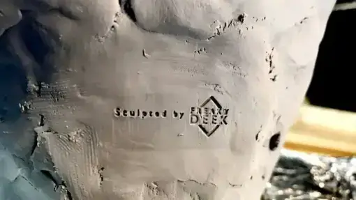 polymer clay sculpture sculpted by freaky-Deek with Logo imprint by hand